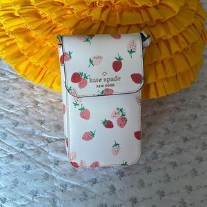 Pink Kate spade can’t fix you phone and some card and money